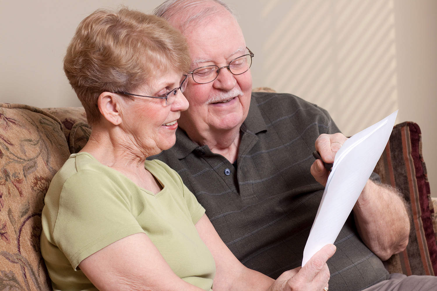 Senior Couple Reviewing Paperwork